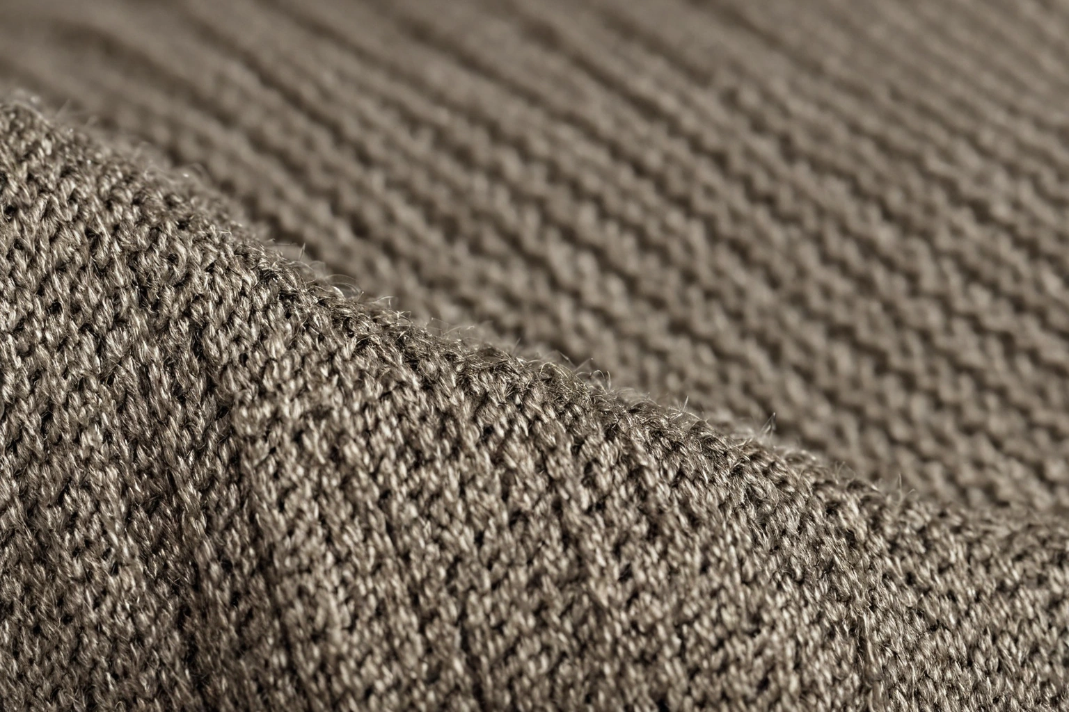 Macro view of a tightly woven performance upholstery fabric showing individual yarn bundles